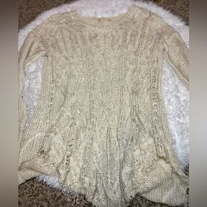 Super cute distressed bottom sweater from altard state